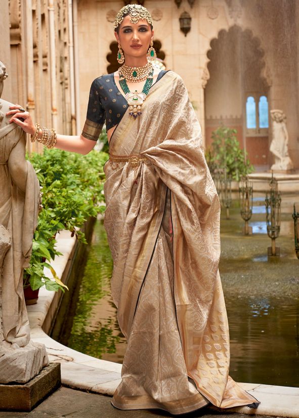 Beige Zari Woven Saree In Art Silk