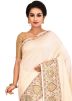 Cream Woven Pure Silk Saree With Blouse