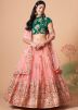 Peach Embroidered Net Lehenga Choli