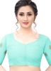 Turquoise Embroidered Heavy Border Net Saree