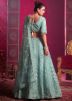 Turquoise Embroidered Lehenga Choli In Net