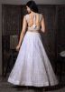 White Embellished Lehenga Choli In Net