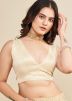Cream Embroidered Saree In Net