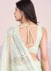 Light Green Sequins Embellished Saree In Net