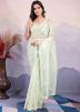 Light Green Sequins Embellished Saree In Net