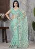 Turquoise Embroidered Net Saree With Blouse