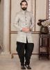 Cream Asymmetric Sherwani With Dhoti In Jacquard