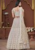 Cream Sequin Work Lehenga Choli In Net