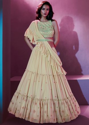 Cream  Ruffled Lehenga Choli In Embroidery