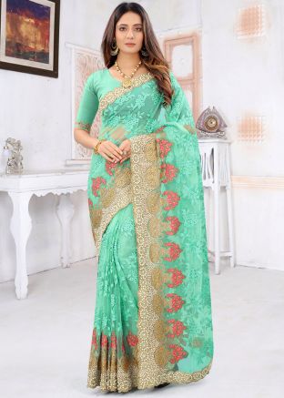 Green Blouse With Heavy Border Net Saree