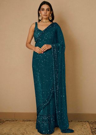 Blue Sequins Embellished Saree In Net