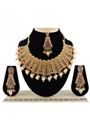 Stone Studded Necklace Set In Golden 