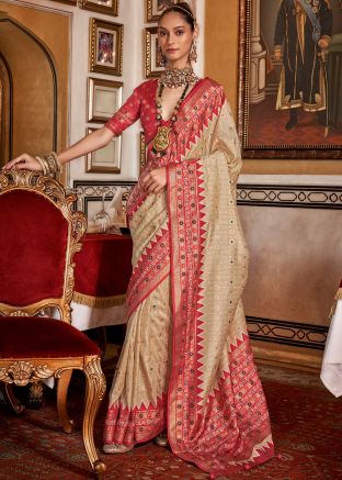 Beige Zari Woven Saree In Art Silk
