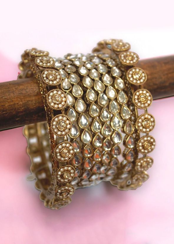 Golden Bangle Set In Stone Work