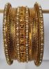 Golden Alloy Based Stone Bangle Set
