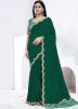 Green Stone Embellished Border Crape Saree