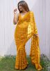 Yellow Embroidered Net Saree