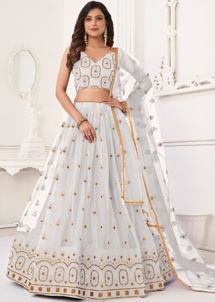 White Embroidered Lehenga Choli In Net