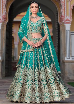 Turquoise Zari Embroidered Net Lehenga Choli
