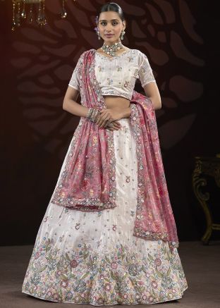 White Embroidered Lehenga Choli In Net