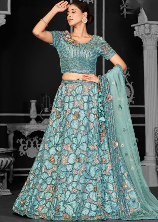 Turquoise Embellished Lehenga Choli In Net