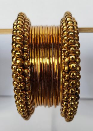 Golden Alloy Based Plain Bangle Set