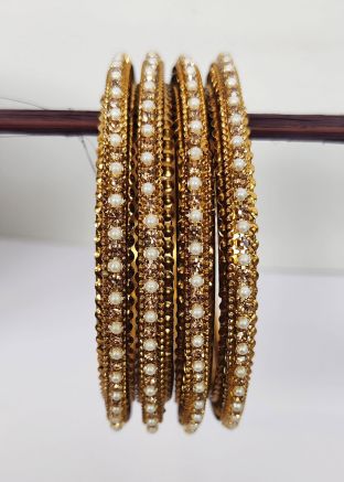 Golden Festive Bangles With Beads Work