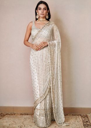 White Embroidered Saree In Net