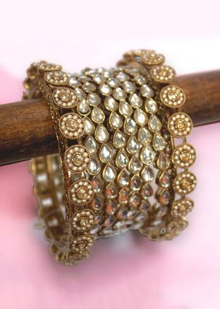 Golden Bangle Set In Stone Work