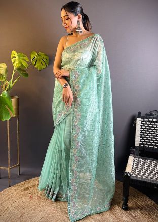 Turquoise Embroidered Saree In Net