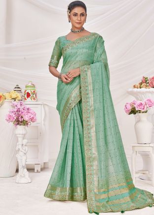Green Zari Embroidered Saree In Linen