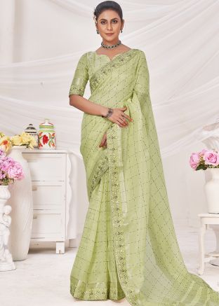 Green Zari Embroidered Saree In Linen