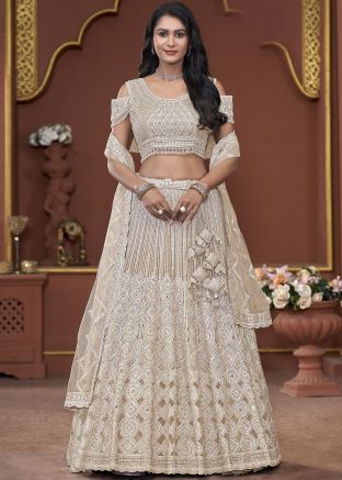 Cream Sequin Work Lehenga Choli In Net